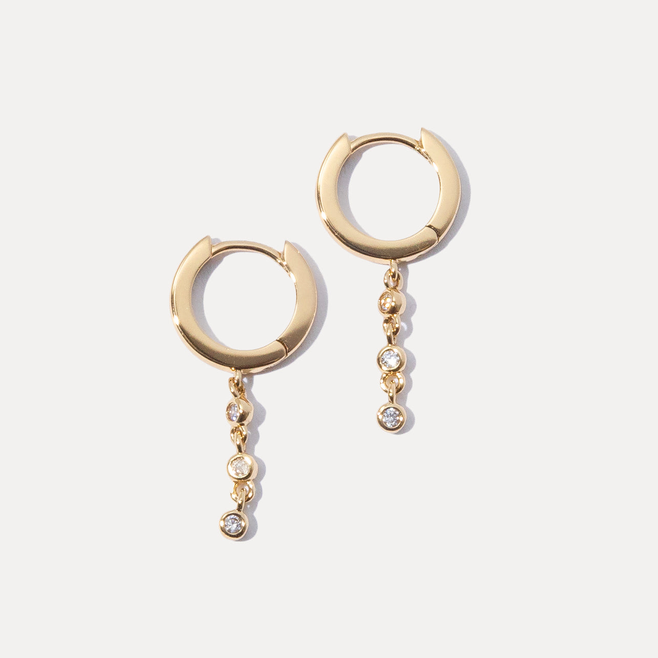 From Hoops to Studs: Exploring Versatile Gold Earring Styles Every Woman Should Own