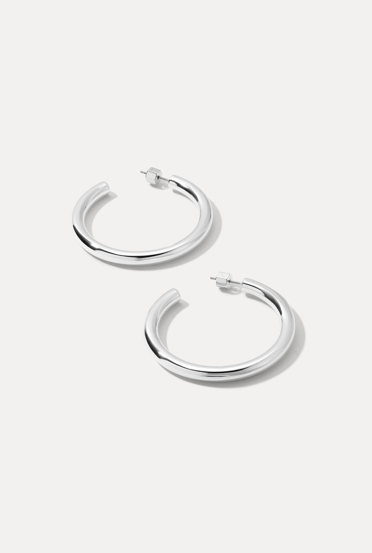 Pair of silver Freda Hoops displayed on a clean white background.