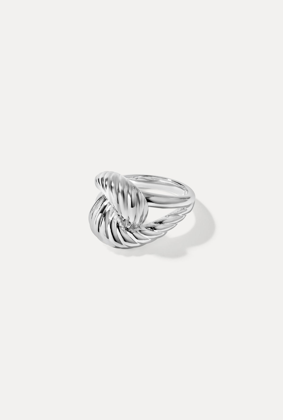 Silver Lorelei ring featuring a delicate band and polished finish, centered on a plain white background.