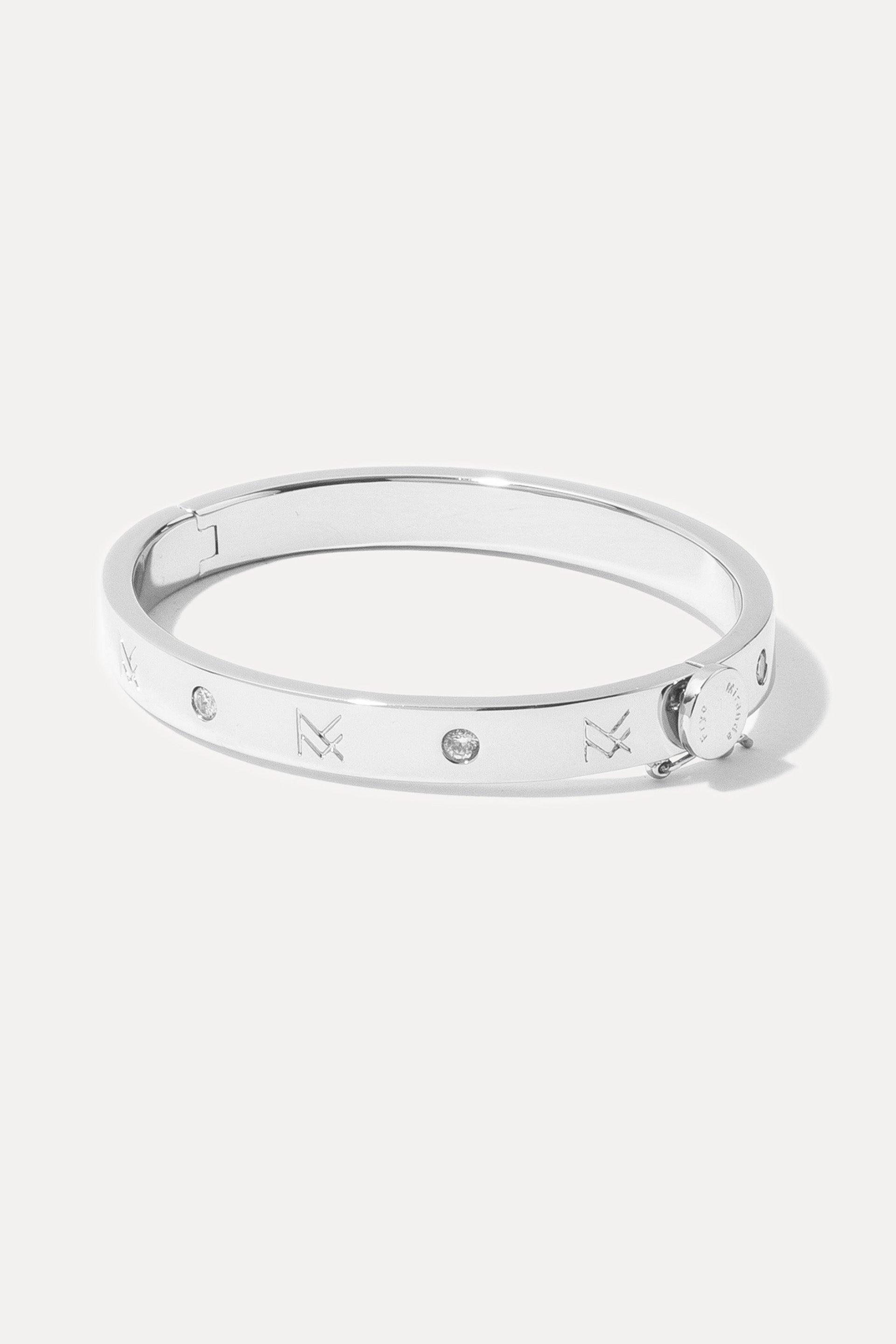 Silver MF Cuff featuring logo engraving and mini CZ stones on a plain white background.