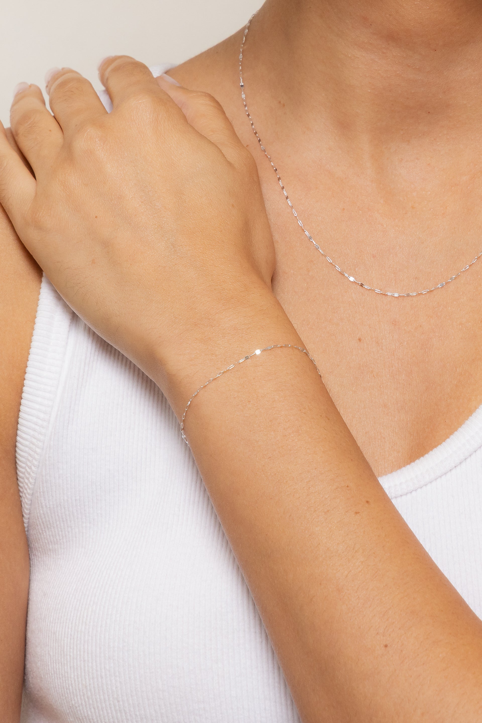 Image of a sterling silver Nora bracelet worn solo on a model's wrist.