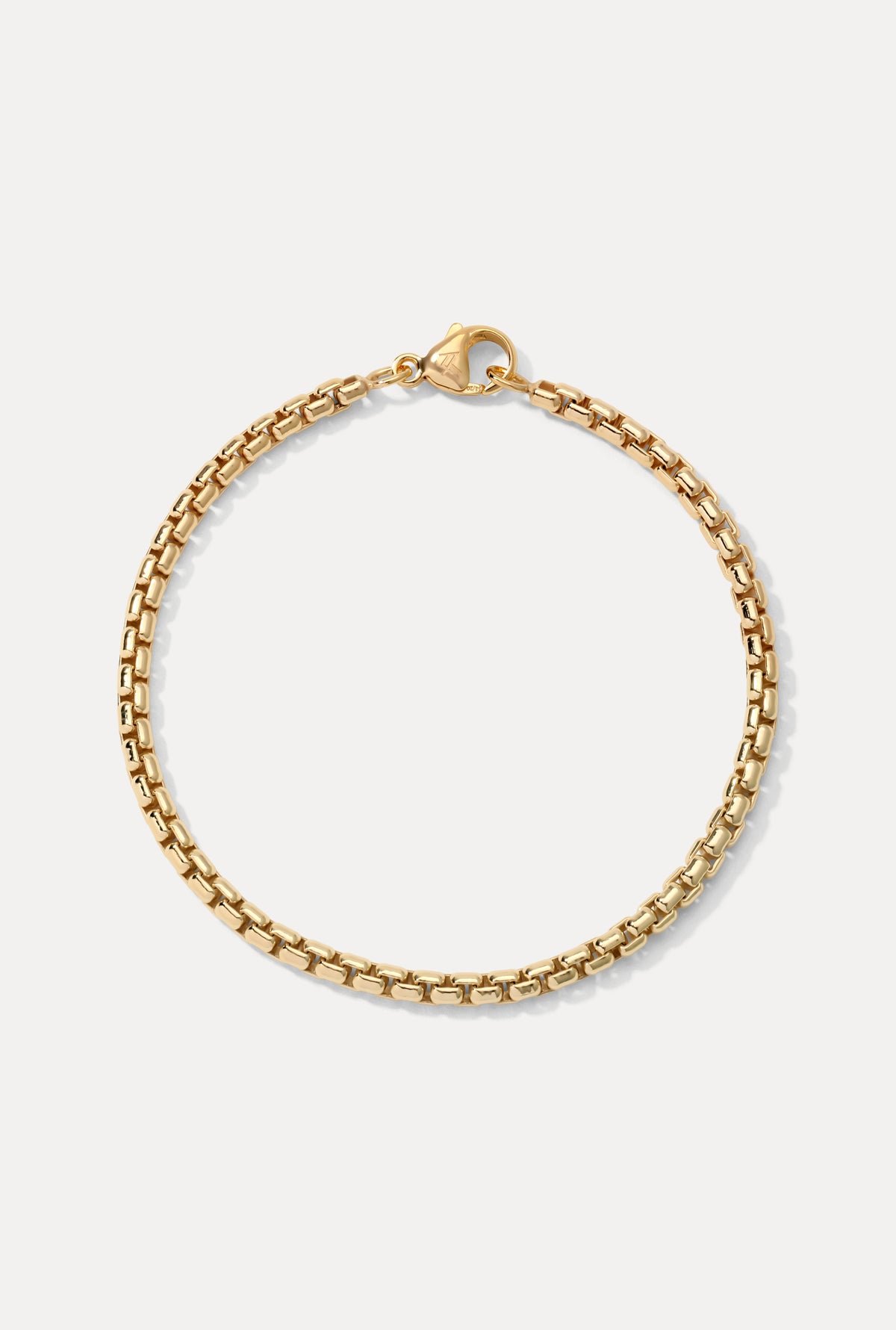 Studio product shot of the gold filled Wellon bracelet laid flat on a clean white background.