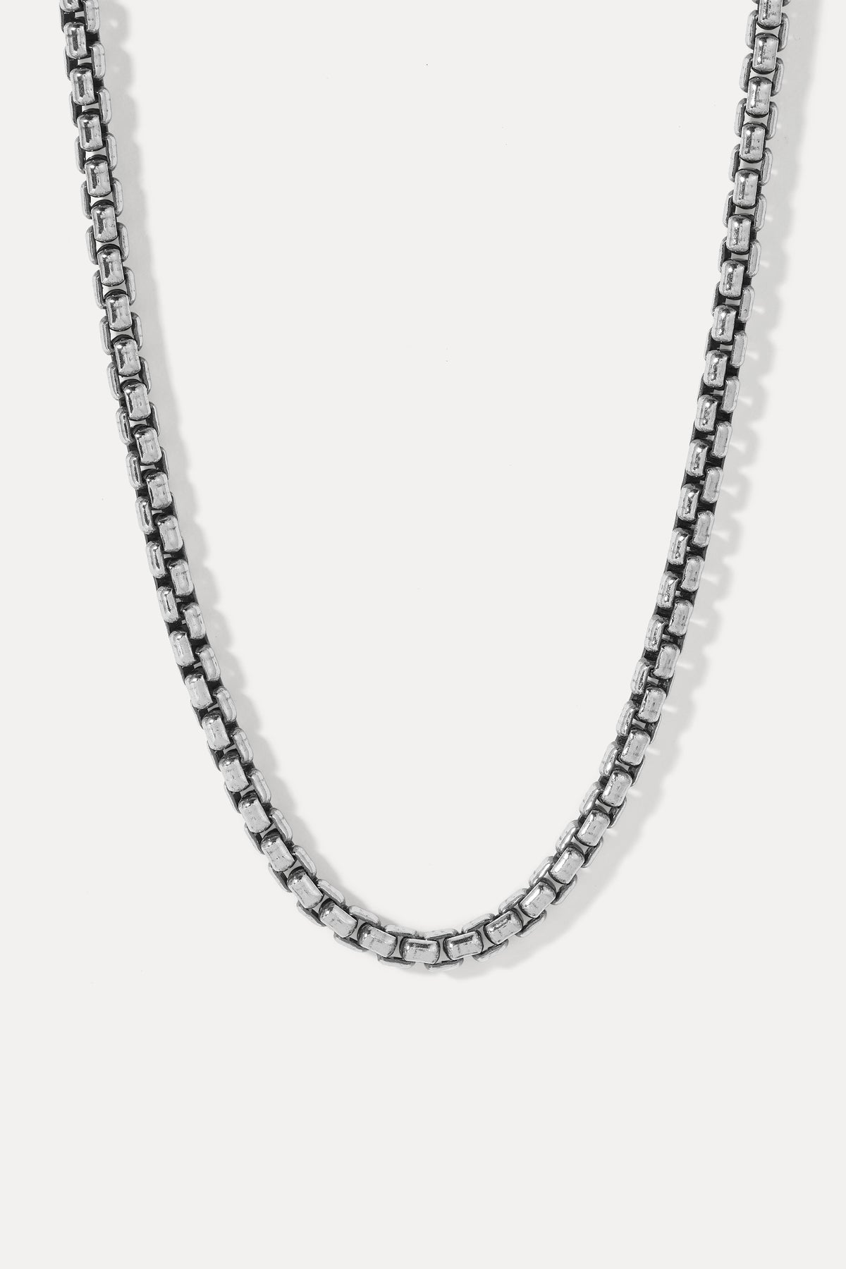 Men's oxidized sterling silver Wellon box chain necklace displayed laid flat on a plain white background.