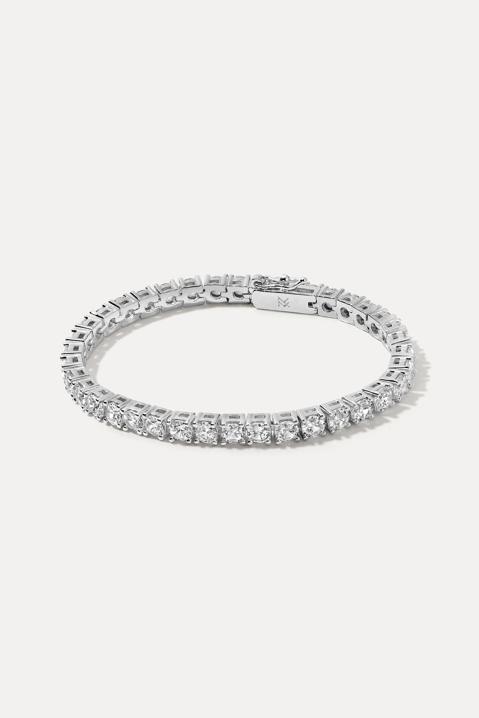 Sterling silver Audrey Bracelet displayed in an oval loop on a white background, showing its CZ tennis setting.