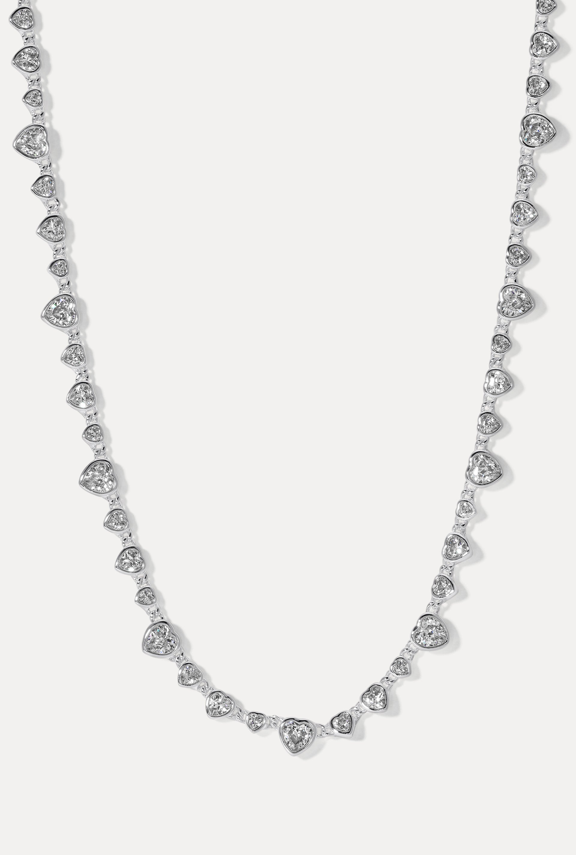 Cora Silver Necklace displayed in a U-shape loop on a plain white background.