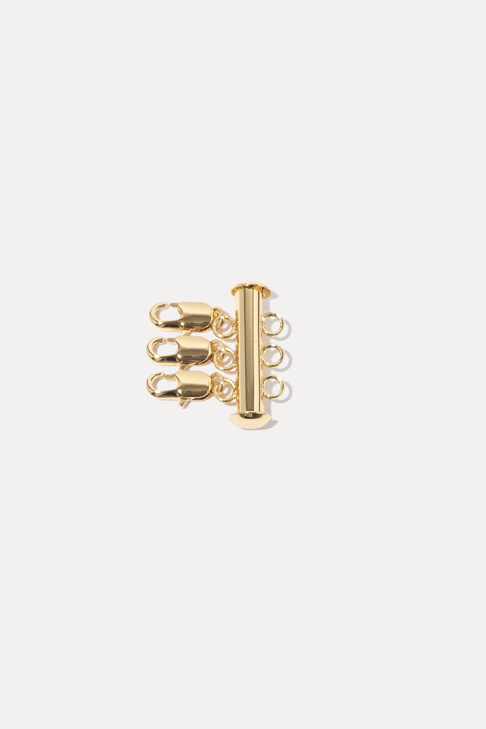 Gold Layer Slayer necklace detangler clasp with three attachment rings, displayed on a white background.