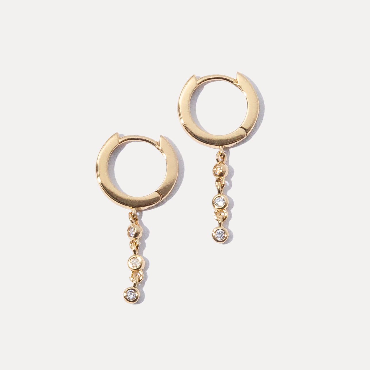 From Hoops to Studs: Exploring Versatile Gold Earring Styles Every Woman Should Own