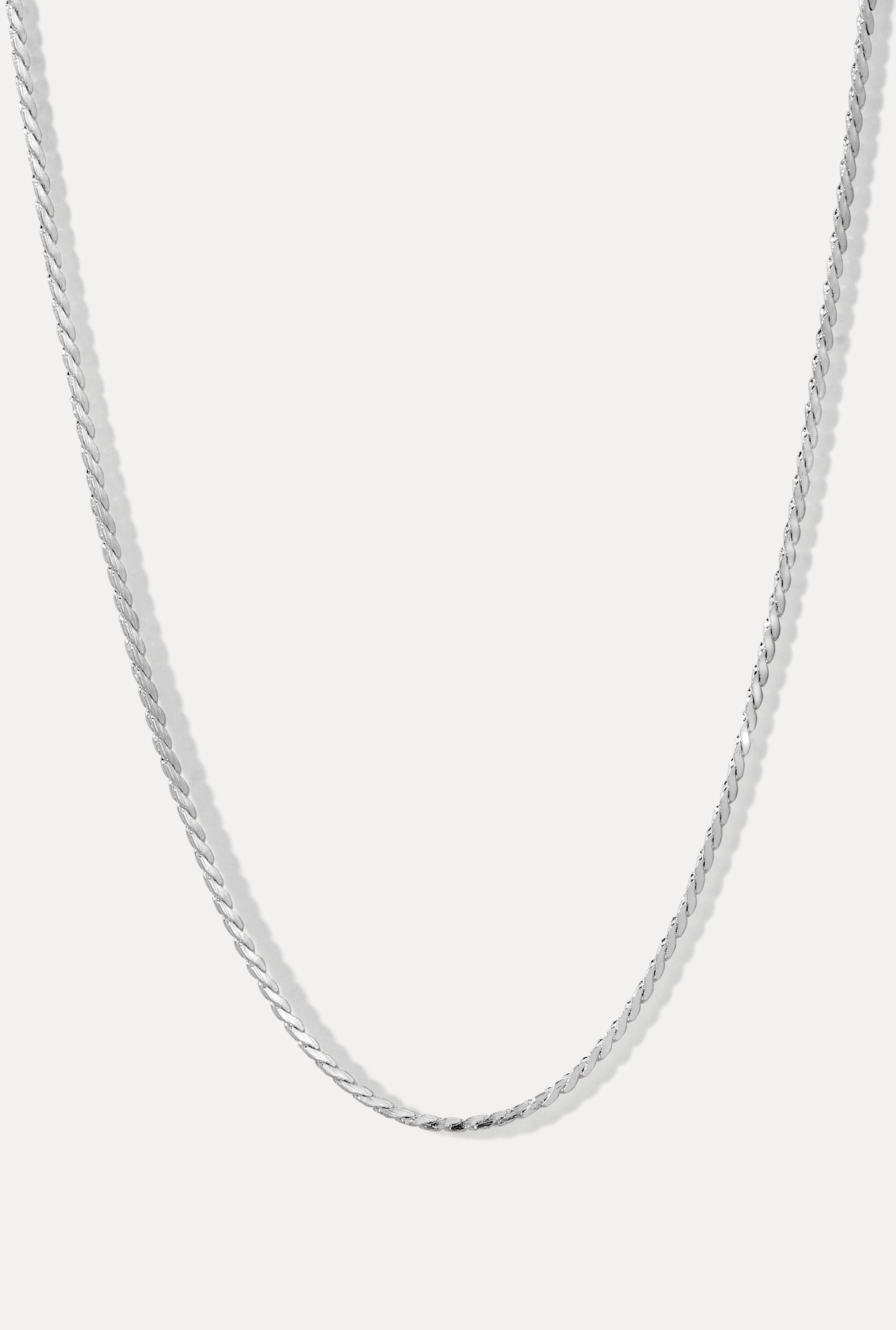 Silver Andee swaged rope chain necklace displayed in a U-shape on a clean white background.