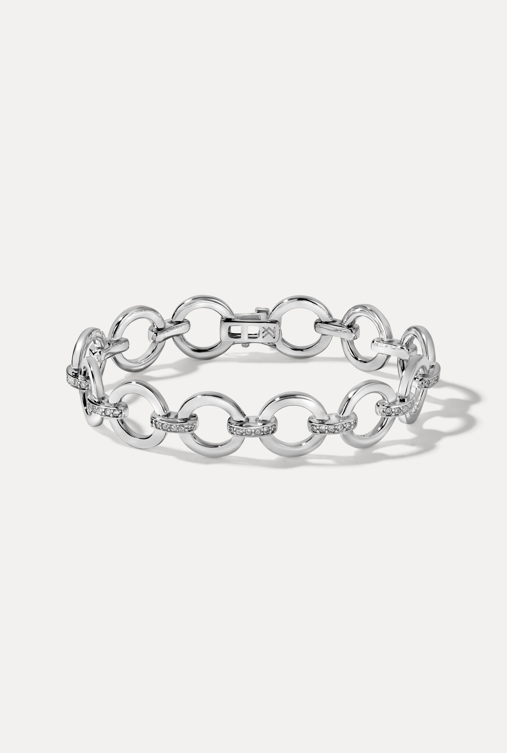 Sterling silver Aria Bracelet with pavé CZ links displayed in an oval on a clean white background.