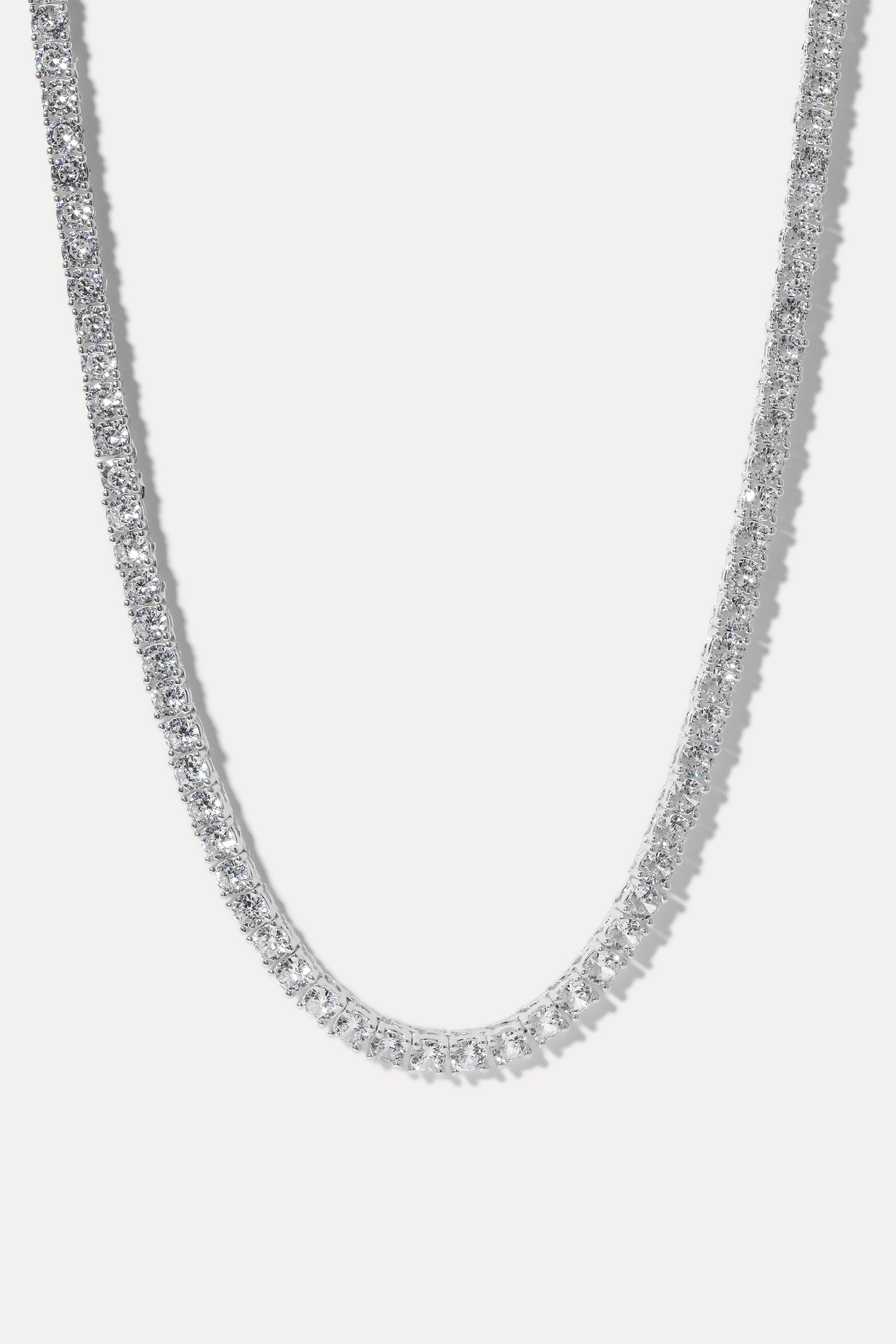 Audrey Silver Tennis Necklace displayed in a loop against a white background.