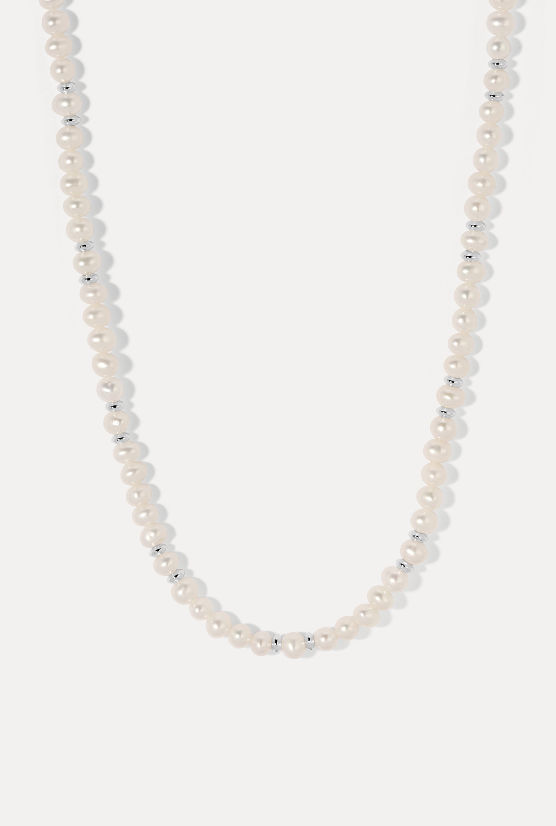 Bette Silver Pearl Necklace displayed in a U-shape loop on a plain white background.