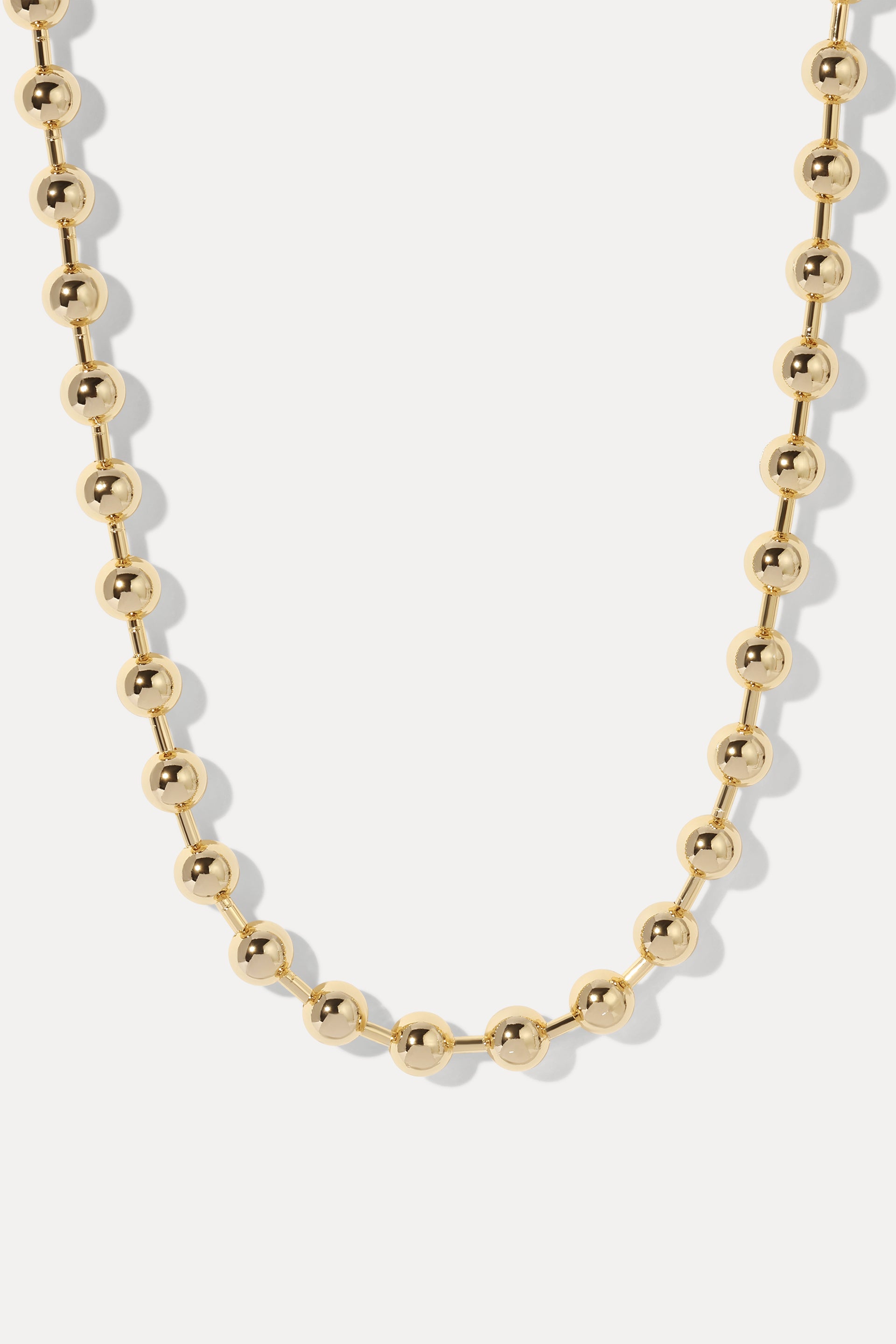 Boston Gold Ball Chain Necklace displayed in a U-shape loop on a plain white background.
