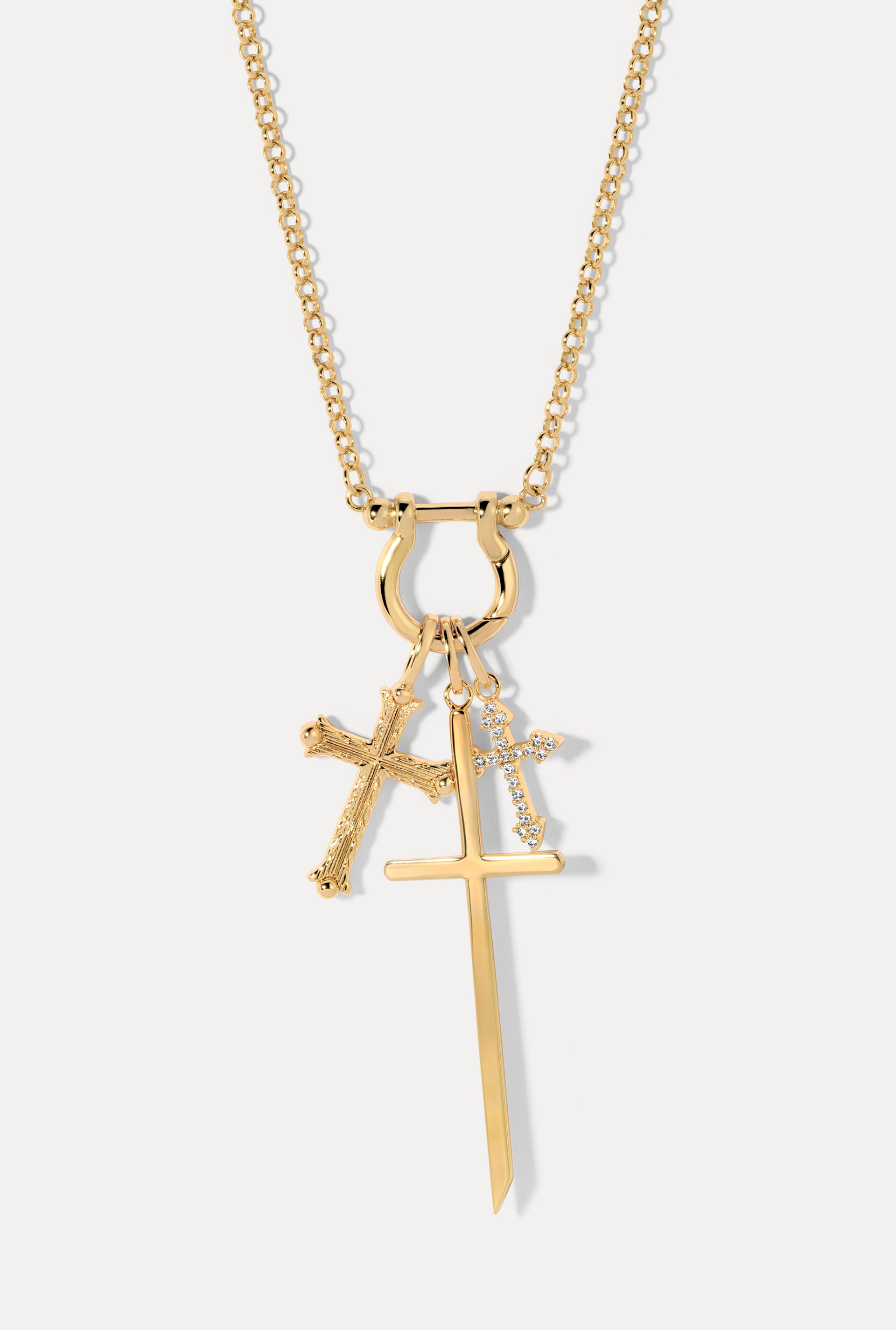 Charm Collector Gold Rolo Chain Necklace with the faith, harmony and cross charms.