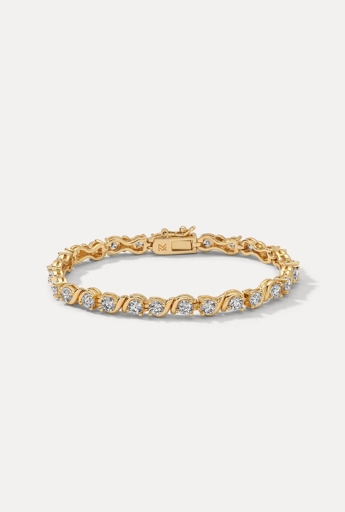 Gold Delilah tennis bracelet on a white background