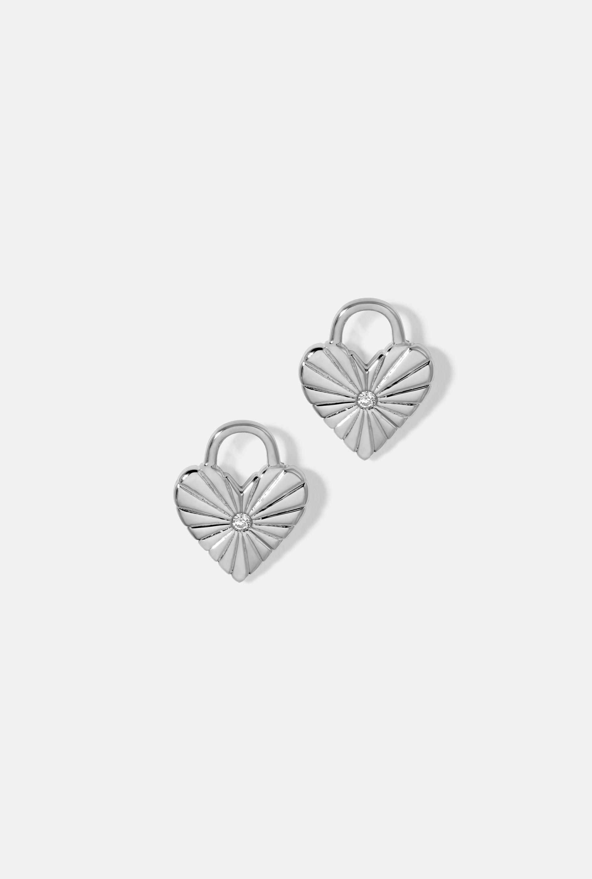 Silver Eleanor heart-shaped earring charms with textured grooves and CZ center stone.
