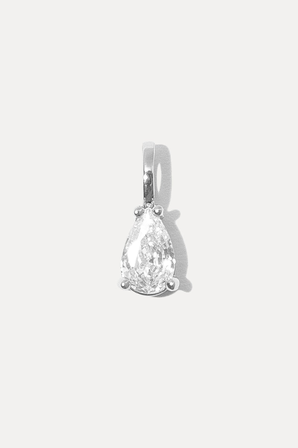 Silver Gianna Charm featuring a teardrop cubic zirconia stone on a white background.