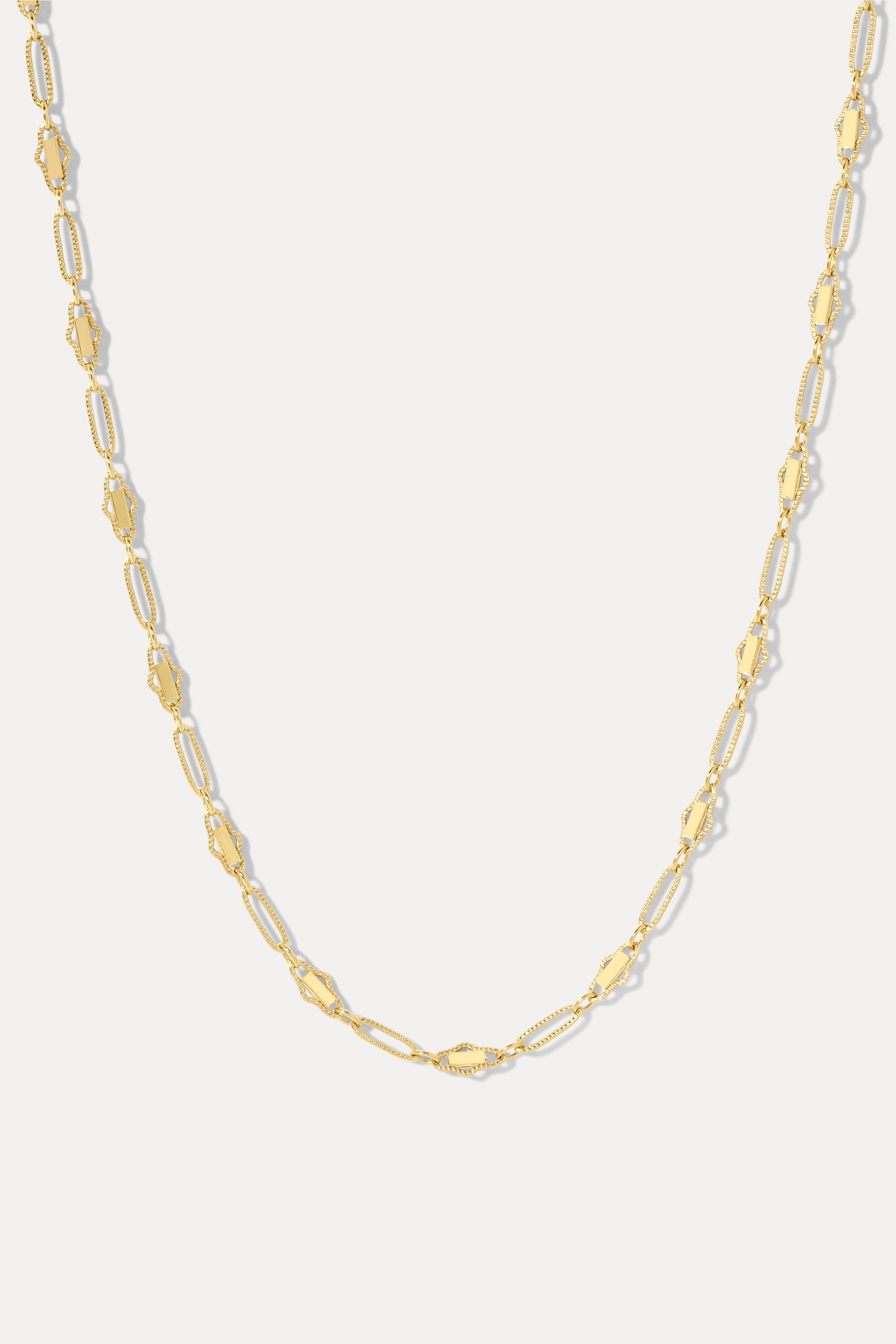 Gold Harlow textured link chain necklace displayed in a U-shape on a clean white background.