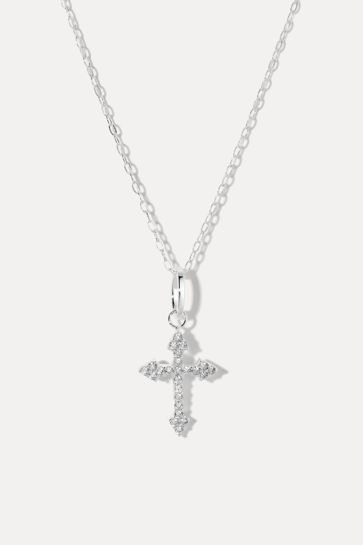 Up close image of the Sophie chain and Harmony charm in silver against a white background.