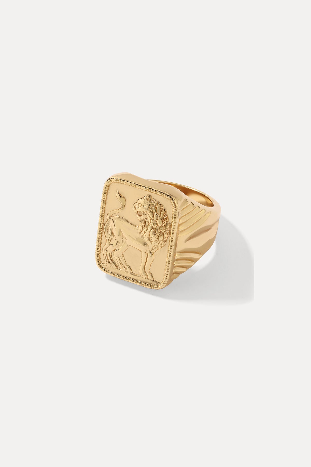 Product shot of the gold Judah signet ring with a starburst-set black gem, on a white background.