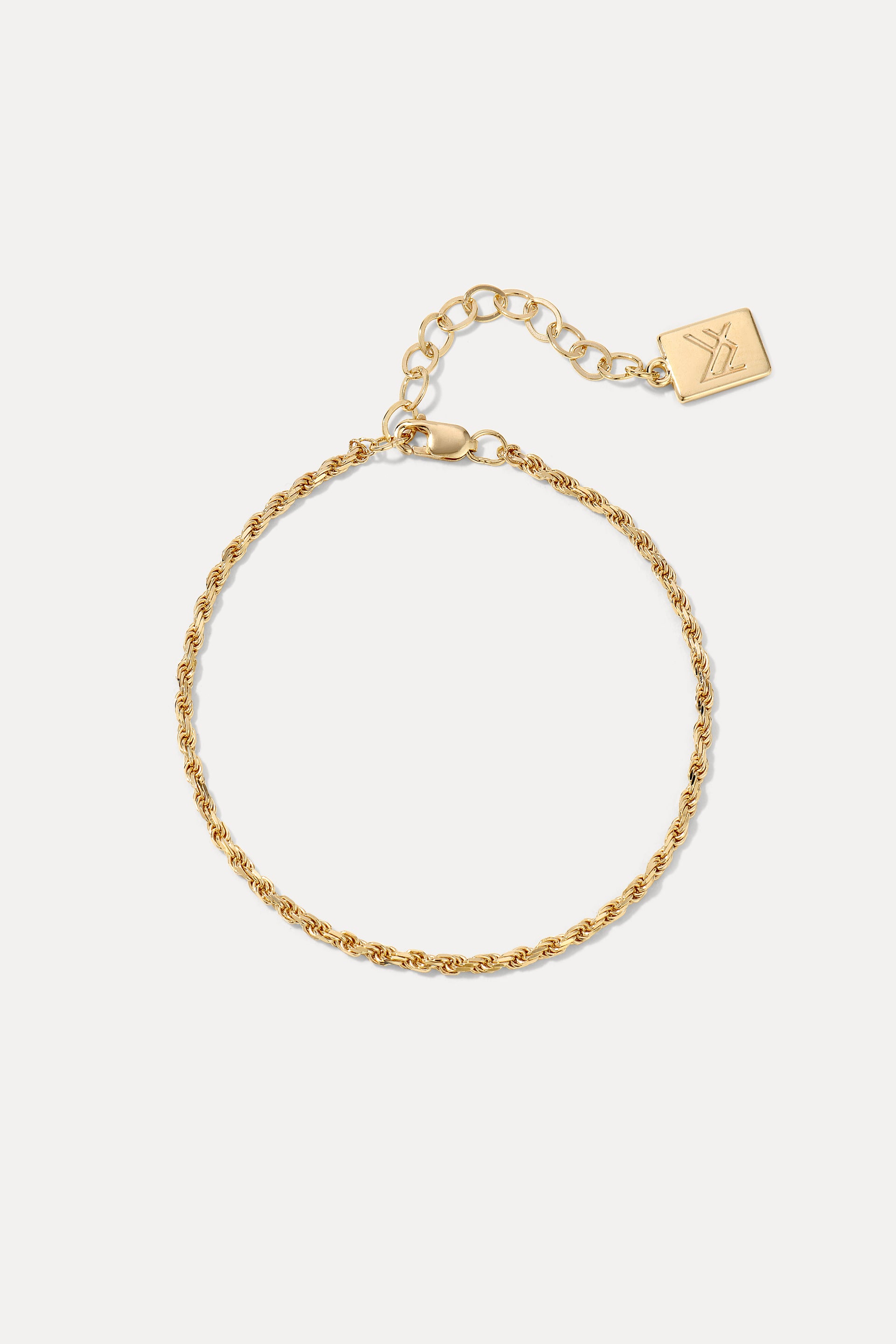 Gold Kate rope chain bracelet displayed in a circle on a plain white background with logo tag.