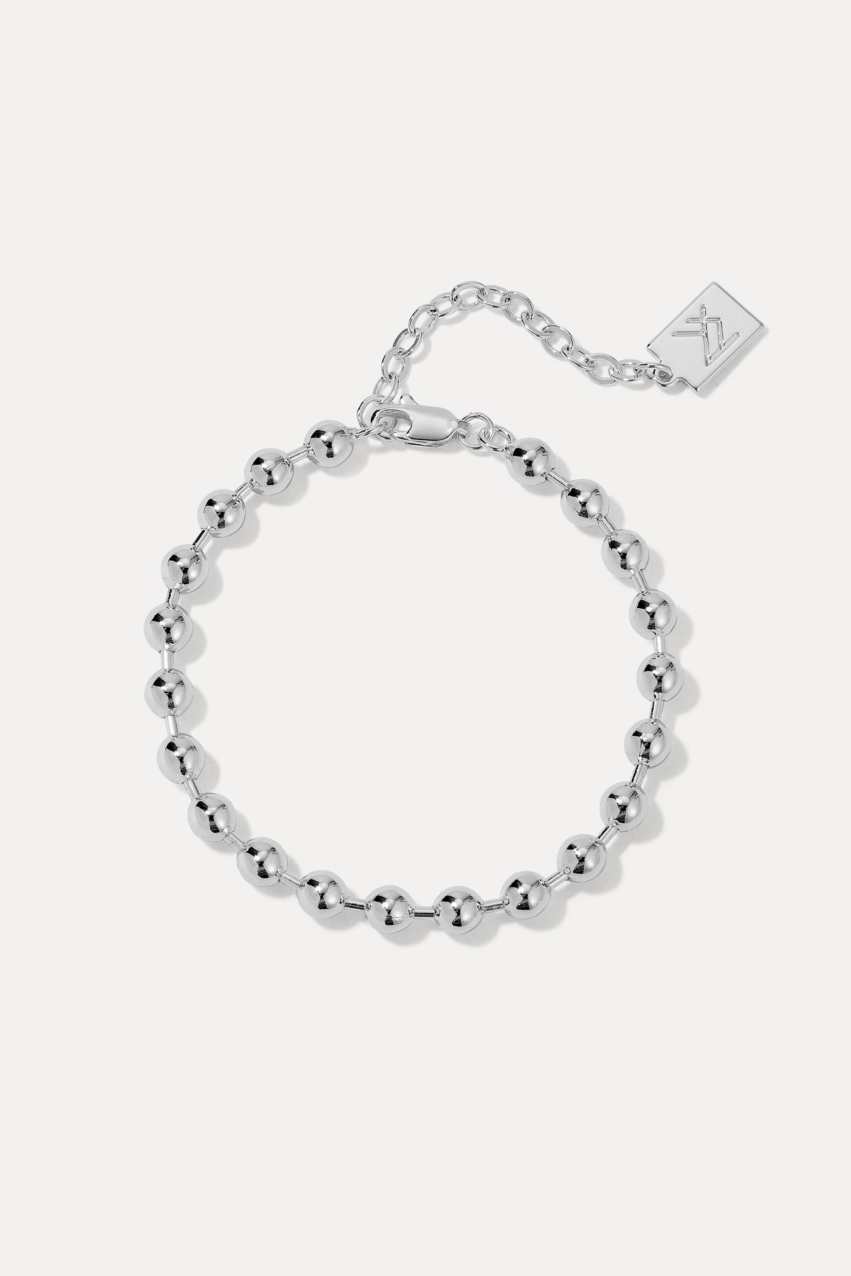 Silver Kelsey bead chain bracelet laid flat in a loop on a plain white background.