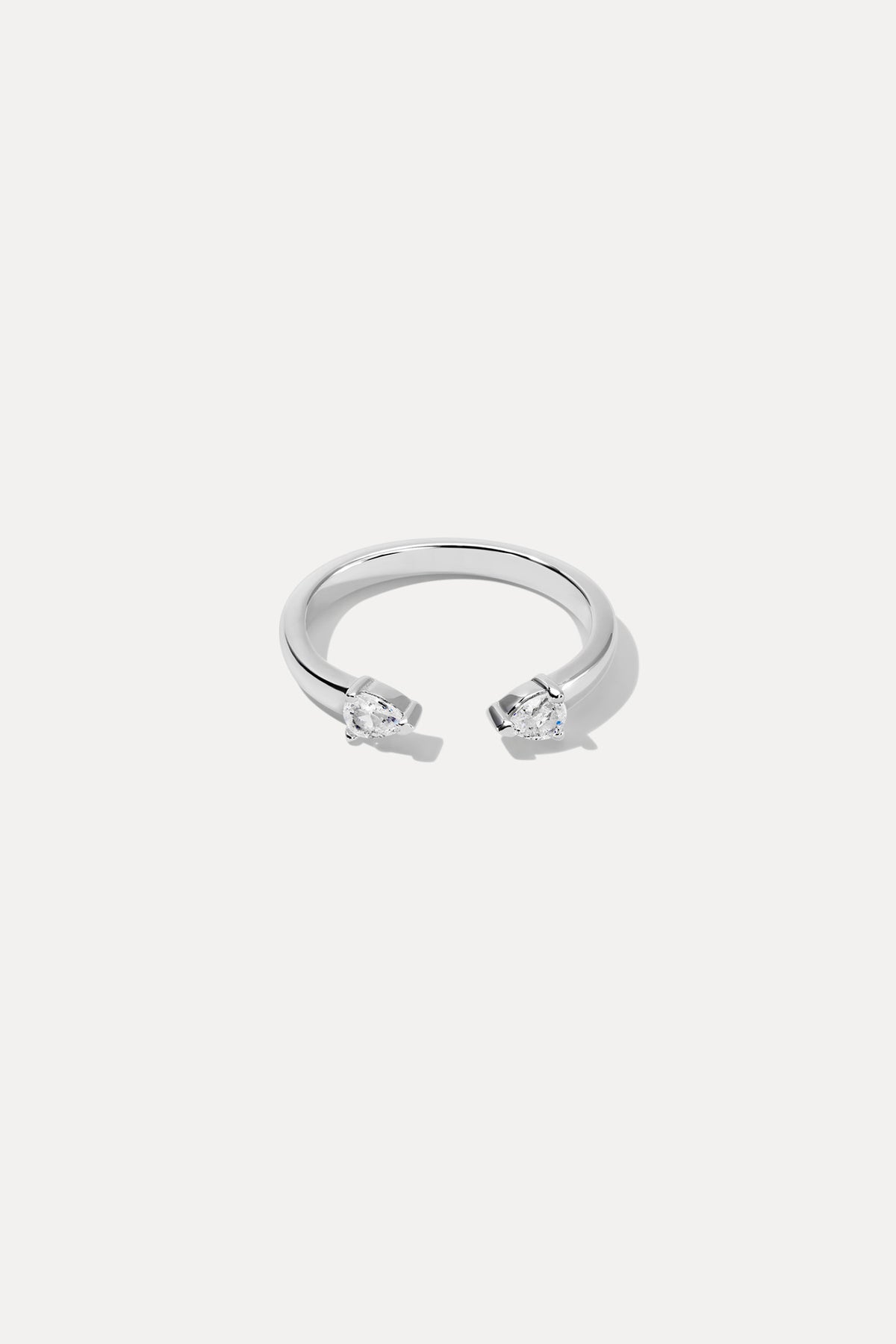 Silver Lyra ring featuring a delicate band and polished finish, centered on a plain white background.