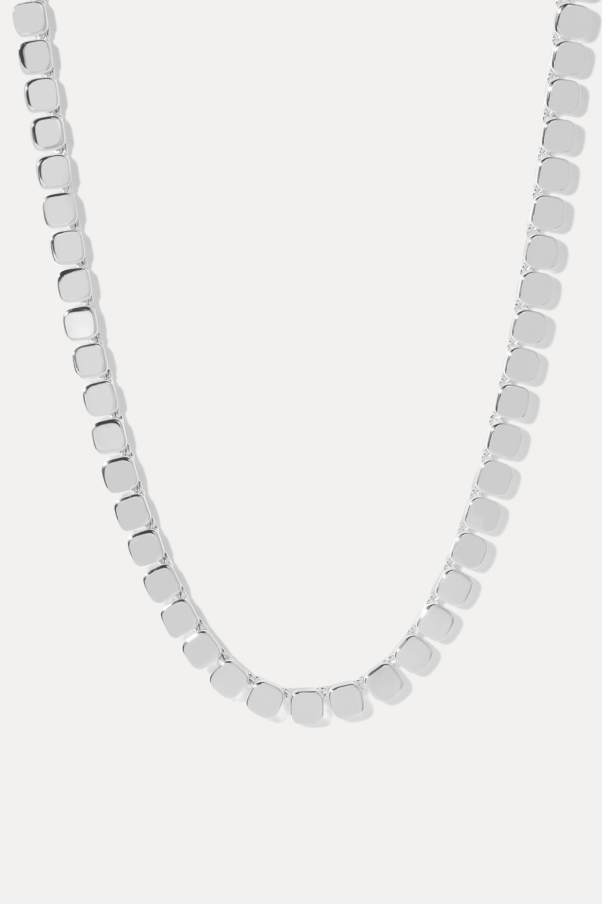 Silver Nicole mirror chain necklace with rectangular flat links, displayed on a clean white background.