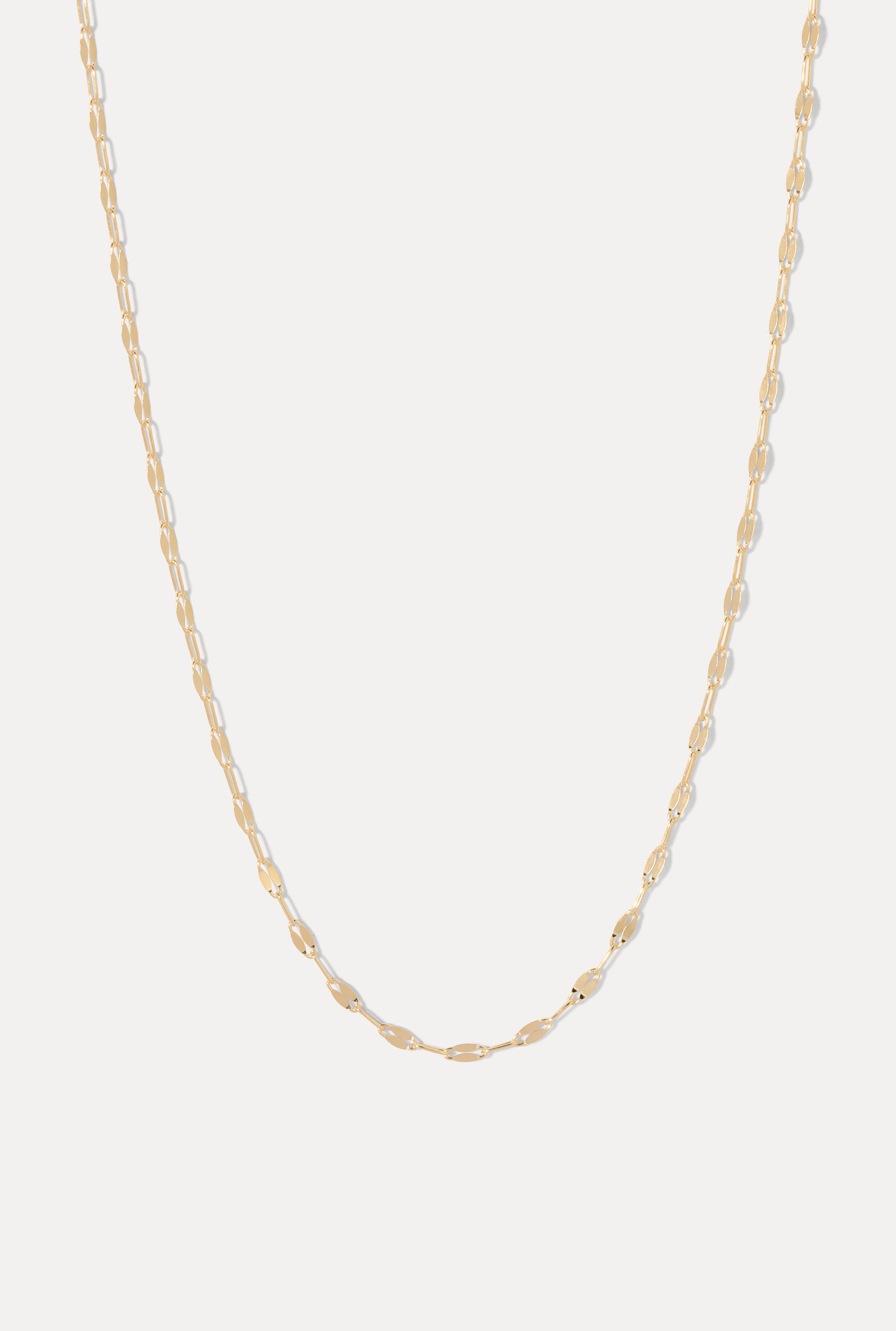 Gold Nora Chain necklace displayed in a U-shape on a clean white background.