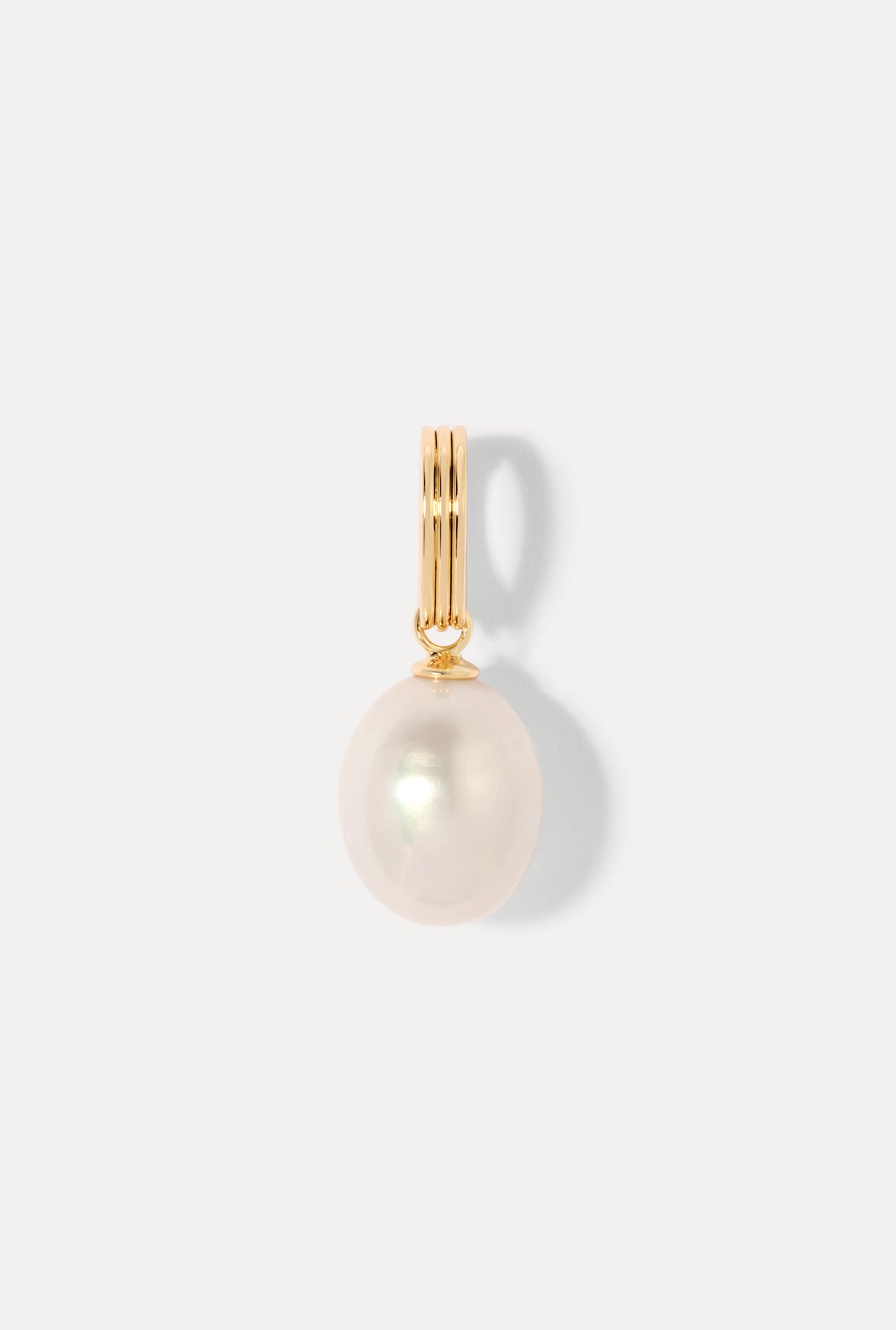 Teardrop pearl charm on a gold bail against a plain white background.