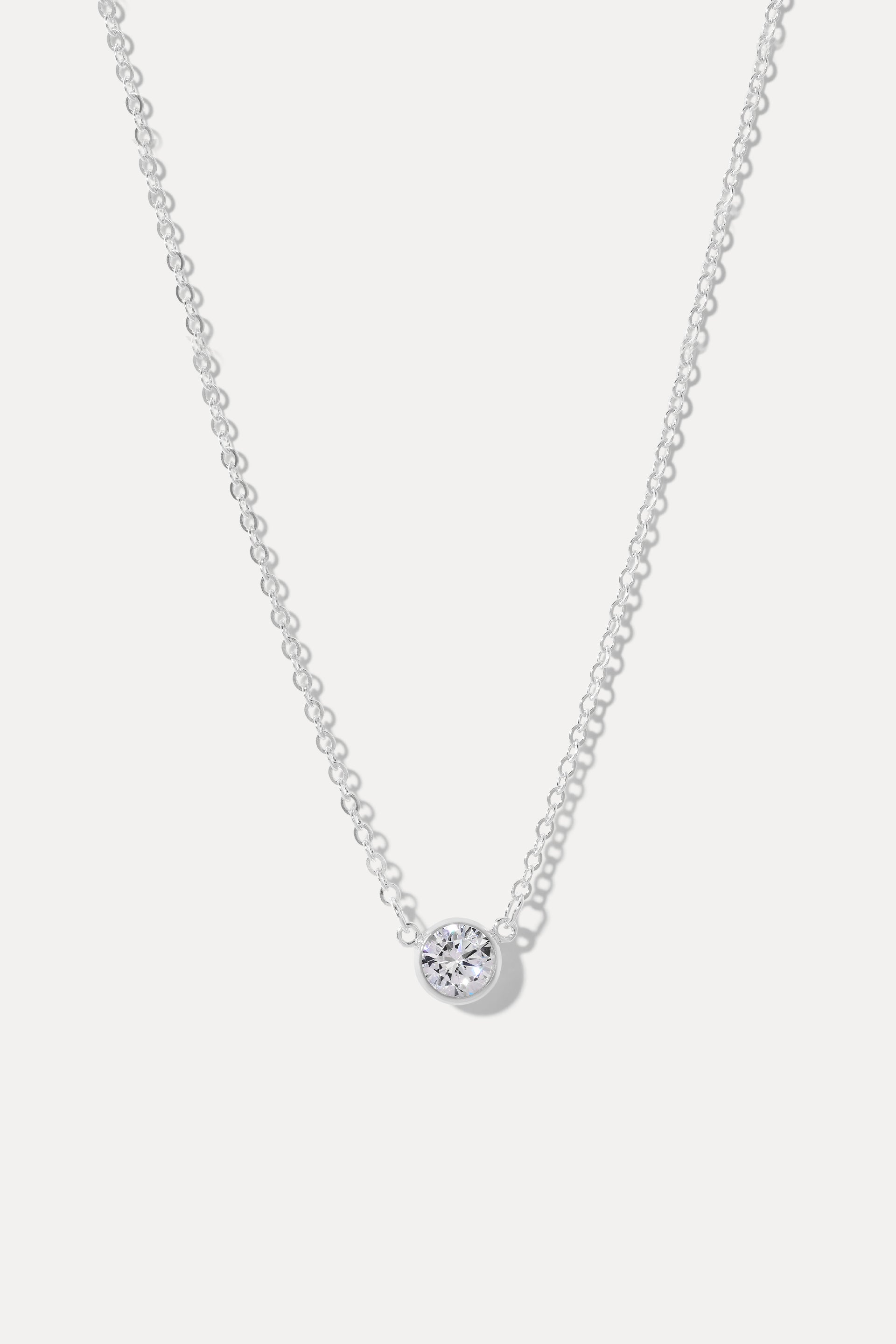 Sterling silver Stephanie necklace with bezel-set cubic zirconia pendant, displayed on a clean white background.