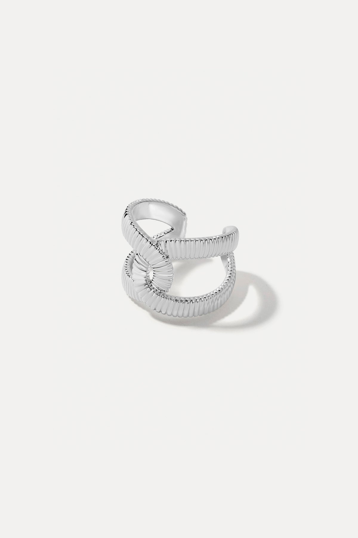 Silver Zoe ring featuring a delicate band and polished finish, centered on a plain white background.