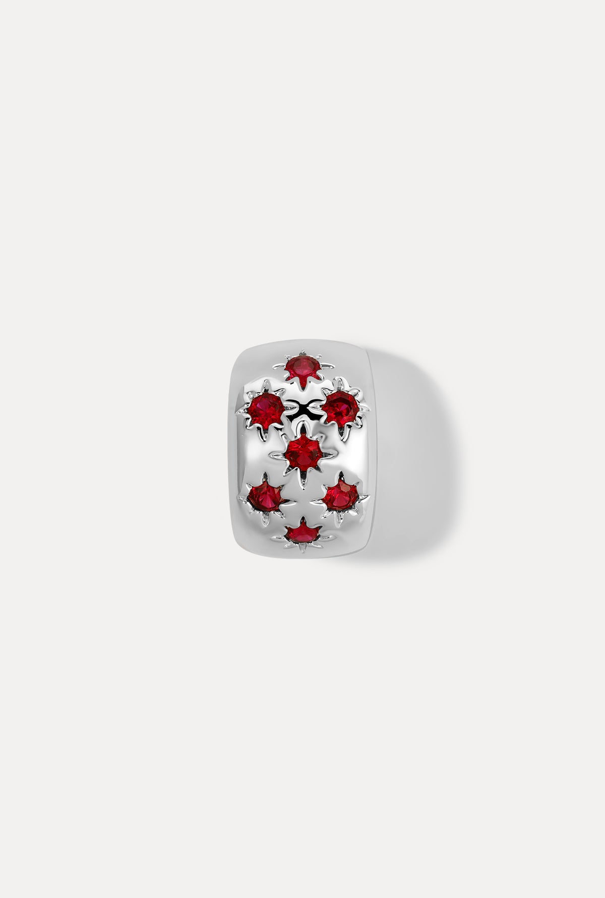 Silver Celeste slider charm with sparkling ruby stones on white background