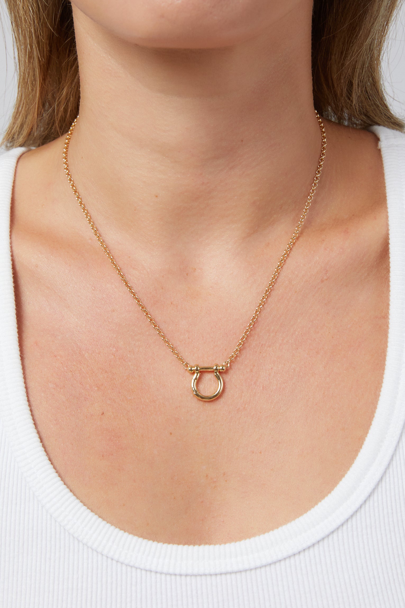 Close-up model photo of the Charm Collector Gold Rolo Chain Necklace.