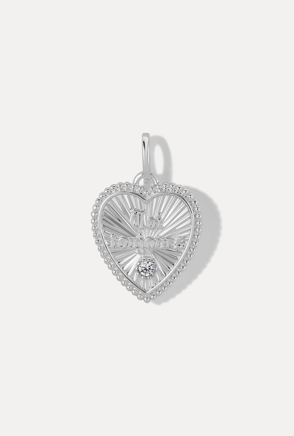 Silver heart-shaped Forever Charm with "Toi Toujours" engraving on a white background.