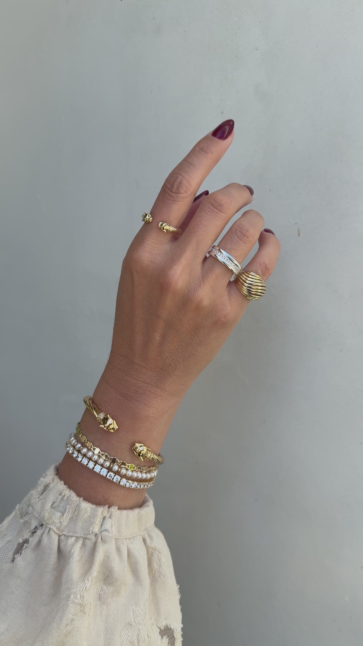 Model video of the Panther Cuff, Bette and Audrey bracelets styled with the Etta, Panther and Ariana Rings.