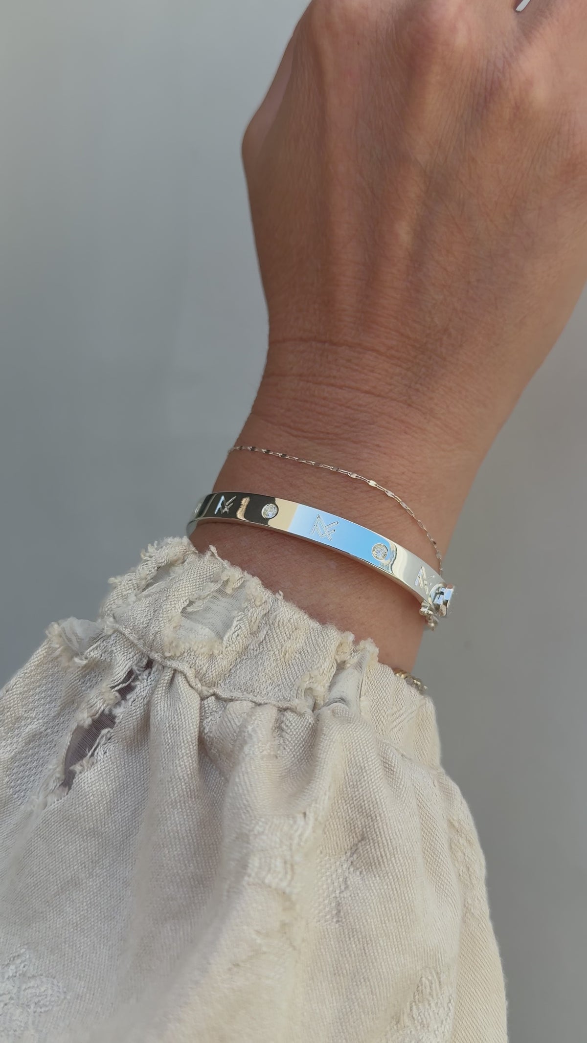 Short video of a wrist stack consisting of the beautiful MF Cuff and dainty Nora Bracelet in silver.